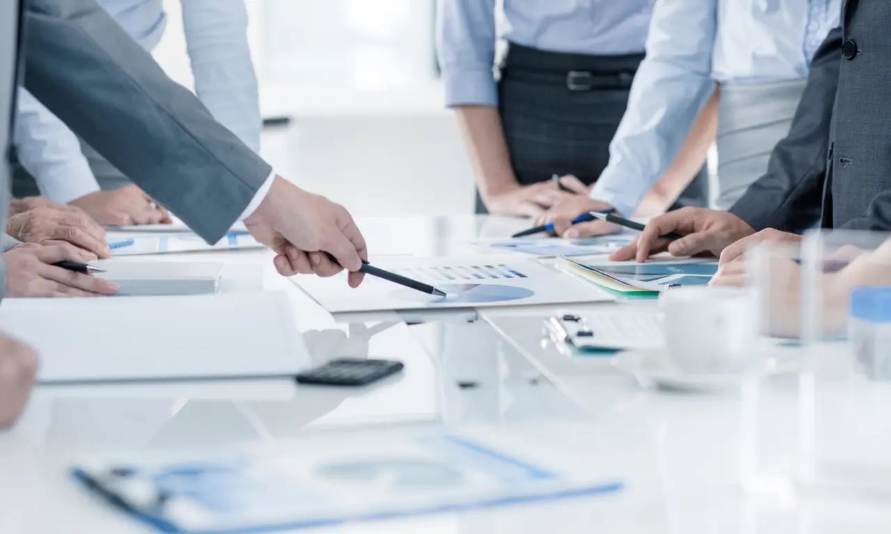 Finance professionals discussing client accounts payable process