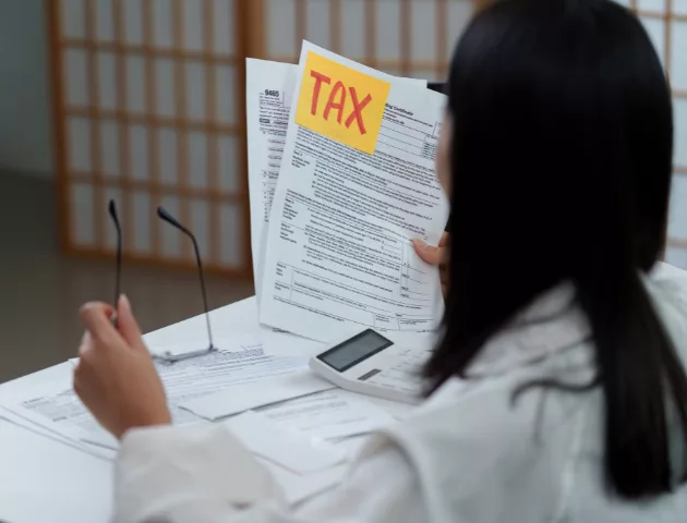 Accountant checking tax documents